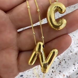Bubble initial necklace
